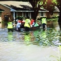 MOVING FLOODED VICTIMS