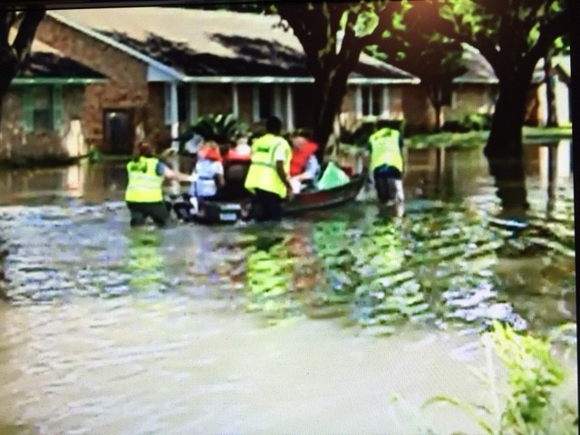 MOVING FLOODED VICTIMS.jpg